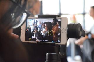 man filming